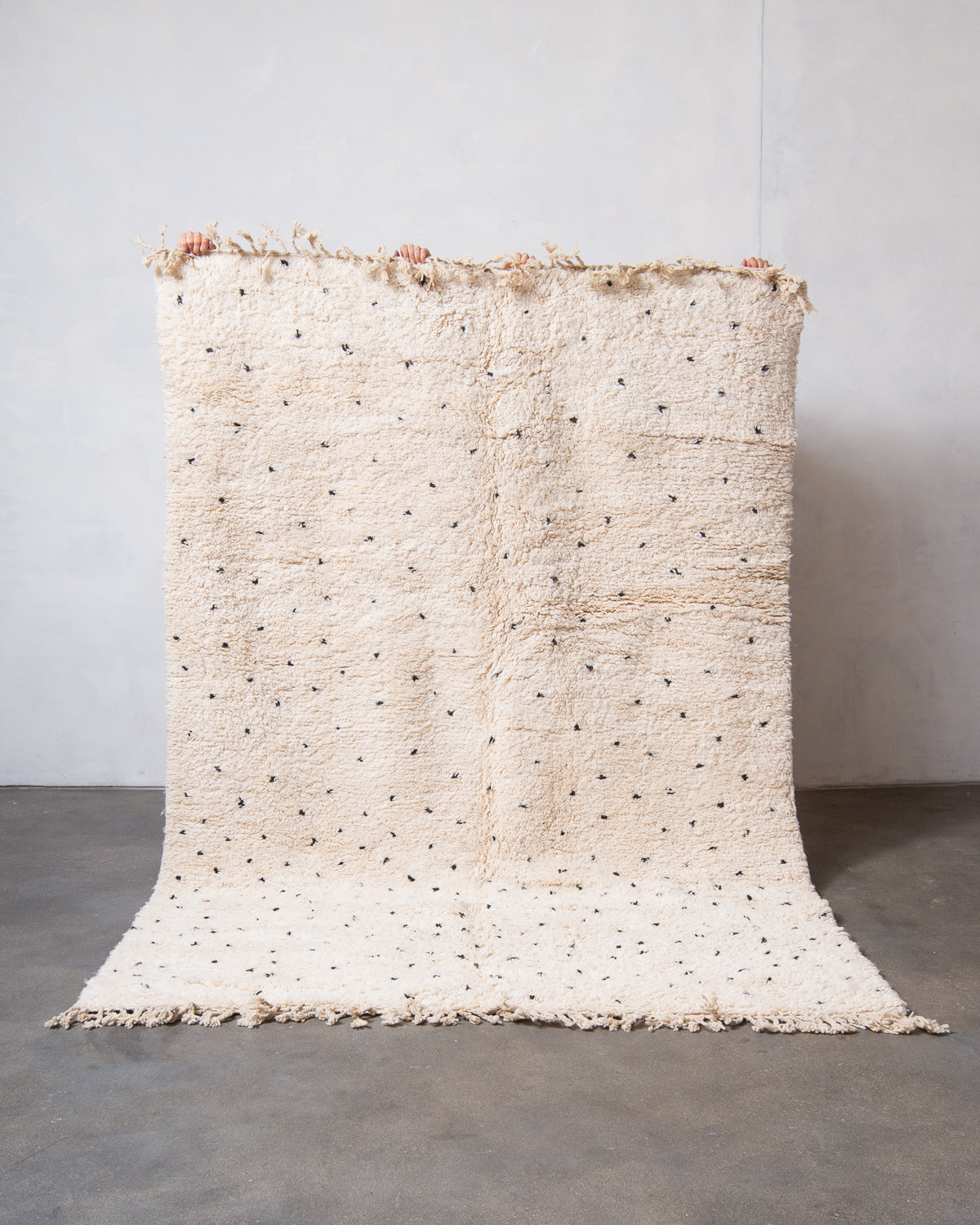 Modern, designer, handcrafted Berber rug from Morocco. Beniourain carpet with beautiful colours and patterns and fluffy wool texture.
